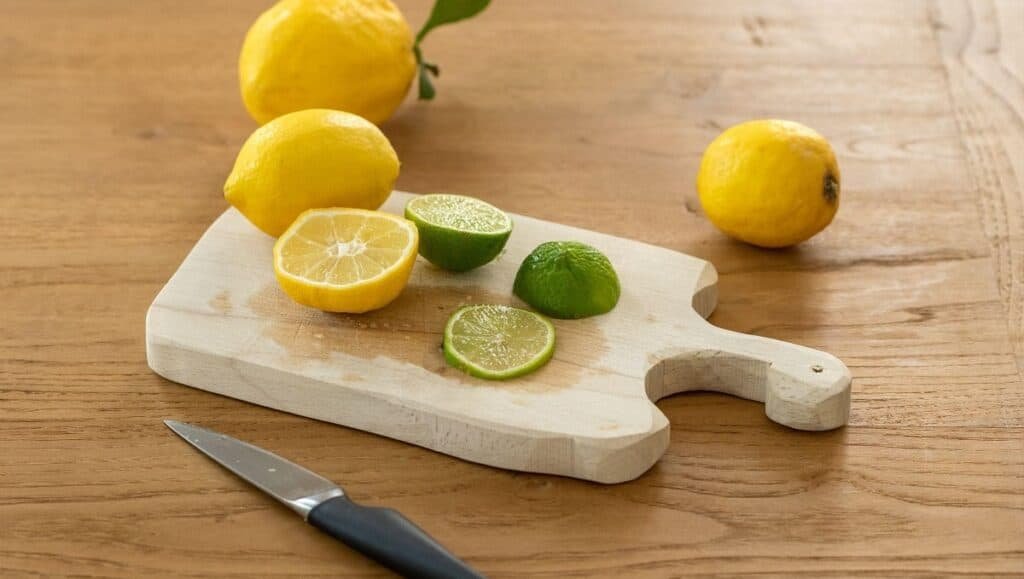 cutting lemons on cutting board