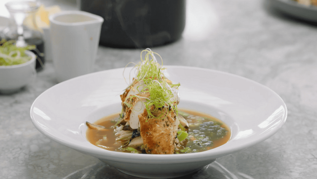 Learn how to whip up a quick, flavorful, and aromatic broth that tastes as if it's been slow-cooked for days. Then, combine it with udon noodles and Szechuan-crusted chicken breast. This is Gordon's twist on the traditional chicken noodle soup.