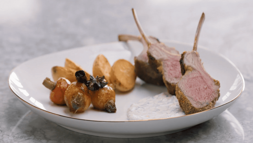 Discover how to skillfully sear a rack of lamb before finishing it off in the oven. Then, create Gordon's modernized versions of traditional mint jelly and mashed mint yogurt sauce. Don't forget to glaze your root vegetables with star anise.